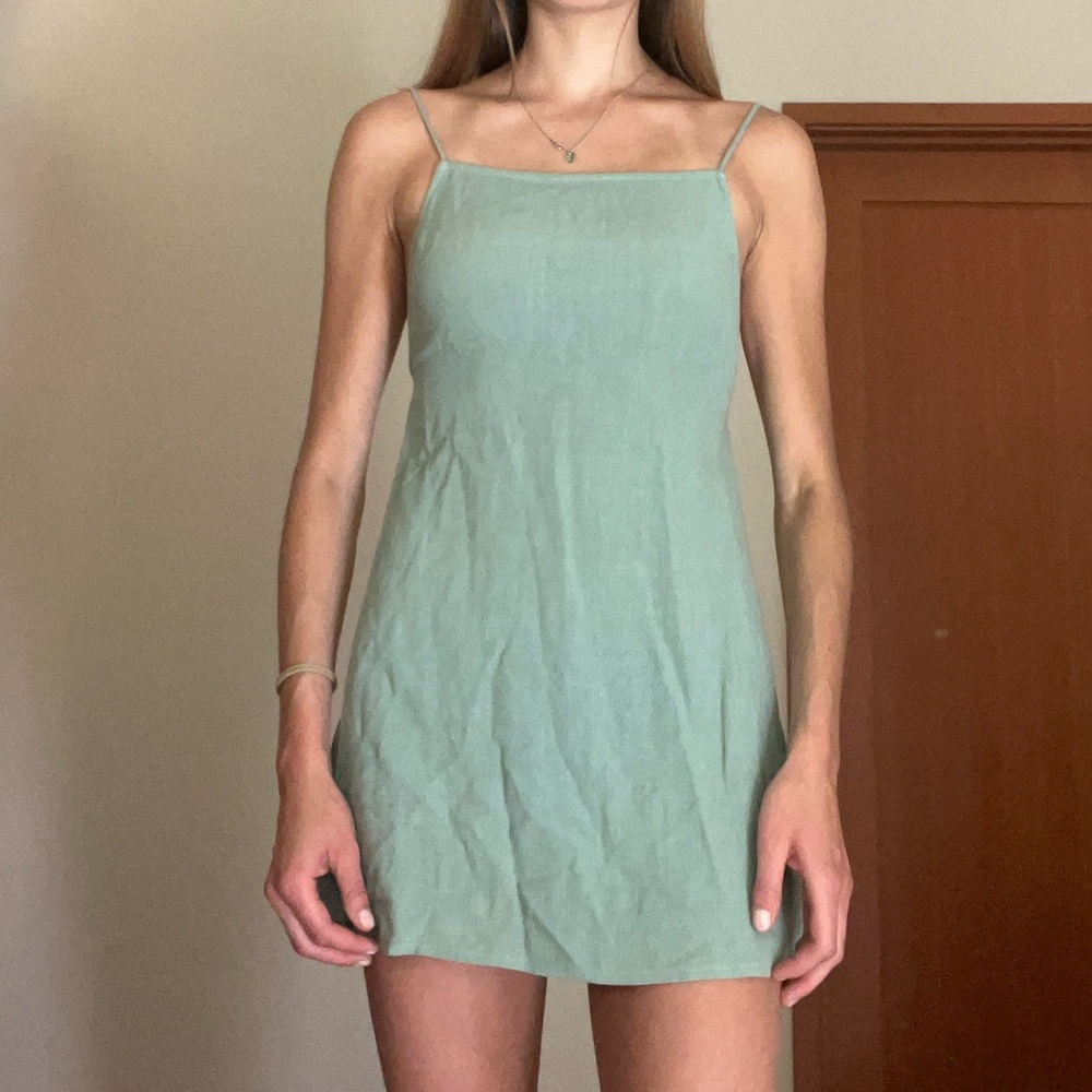 Sage boatneck linen mini dress from Princess Polly